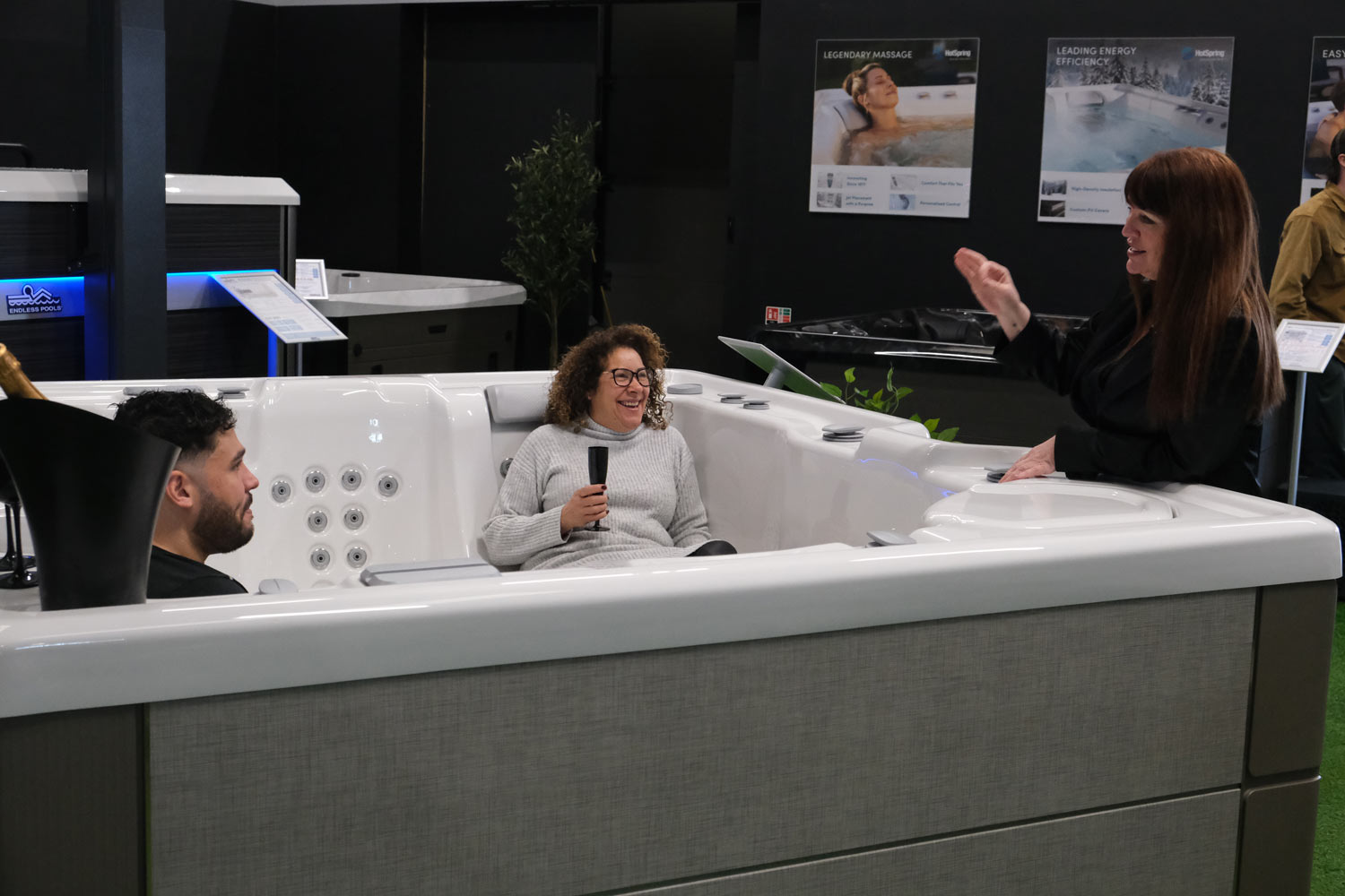 Couple in hot tub in showroom