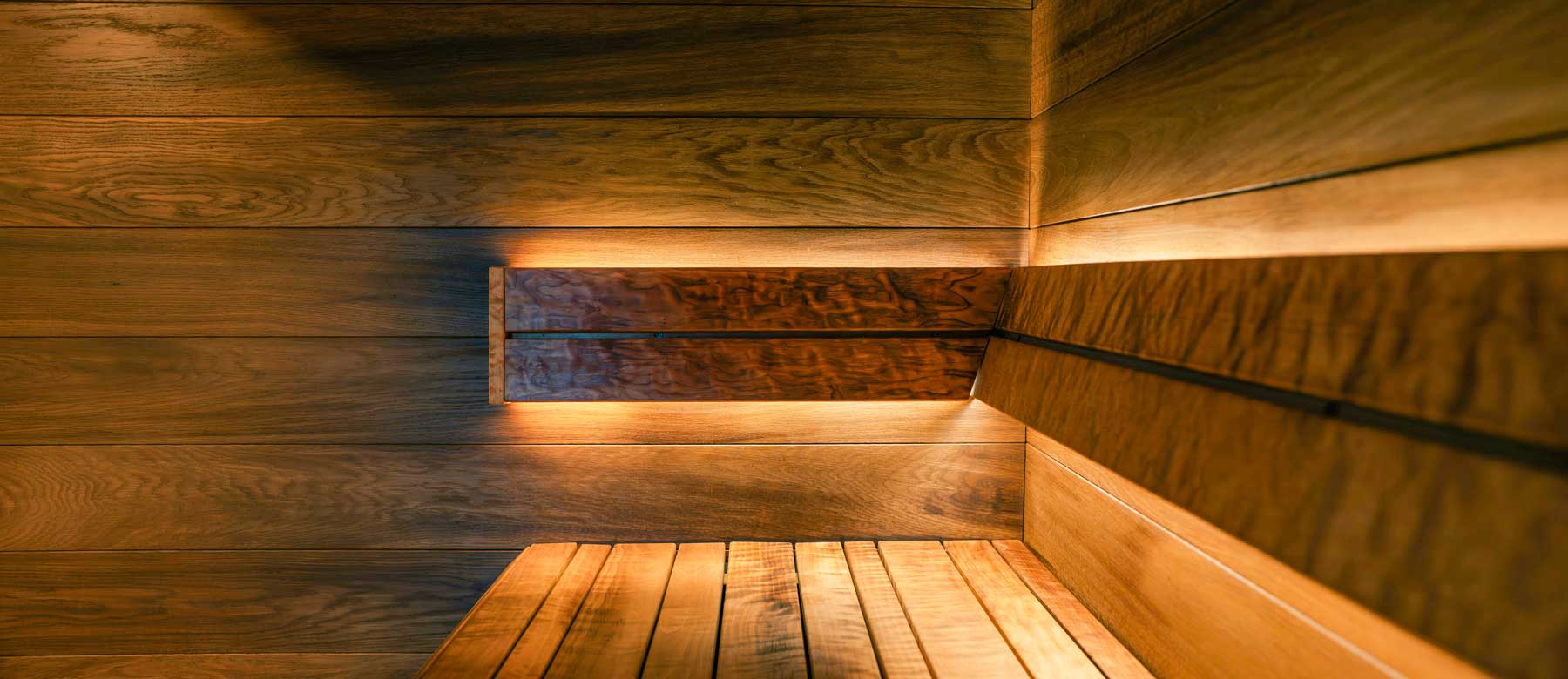 The wooden interior of a sauna