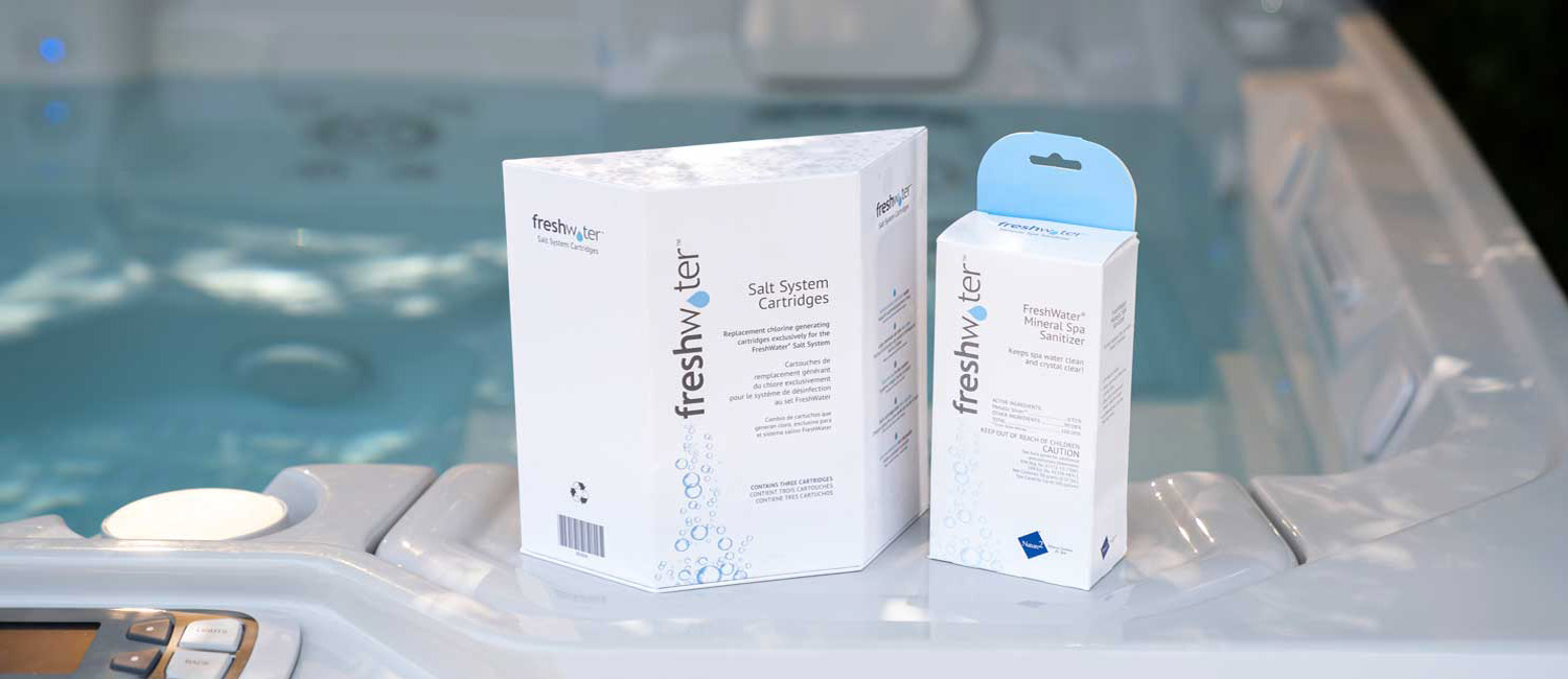 Two boxed Freshwater Salt components on the side of a full hot tub