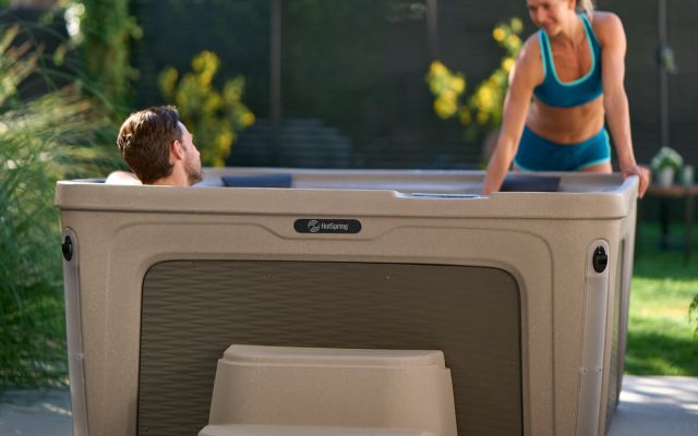family enjoys freeflow hot tub