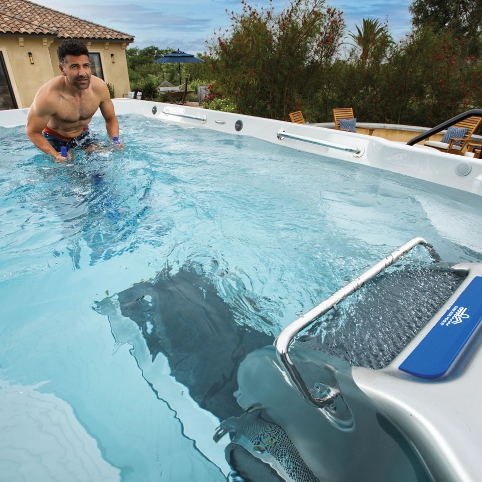 Man On Aqua Bike In Swim Spa