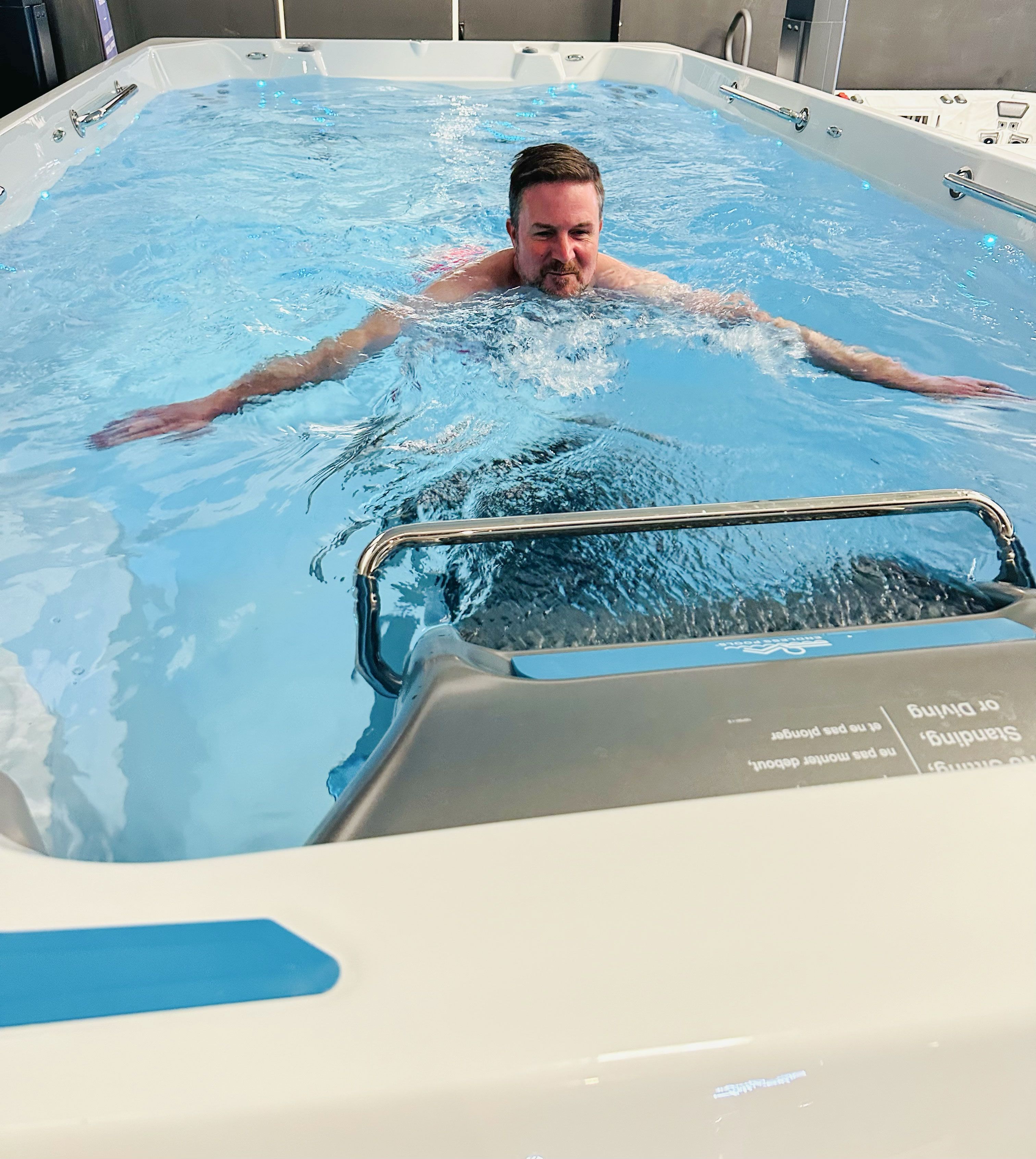 Man using Endless Pool and Hydrodrive Current