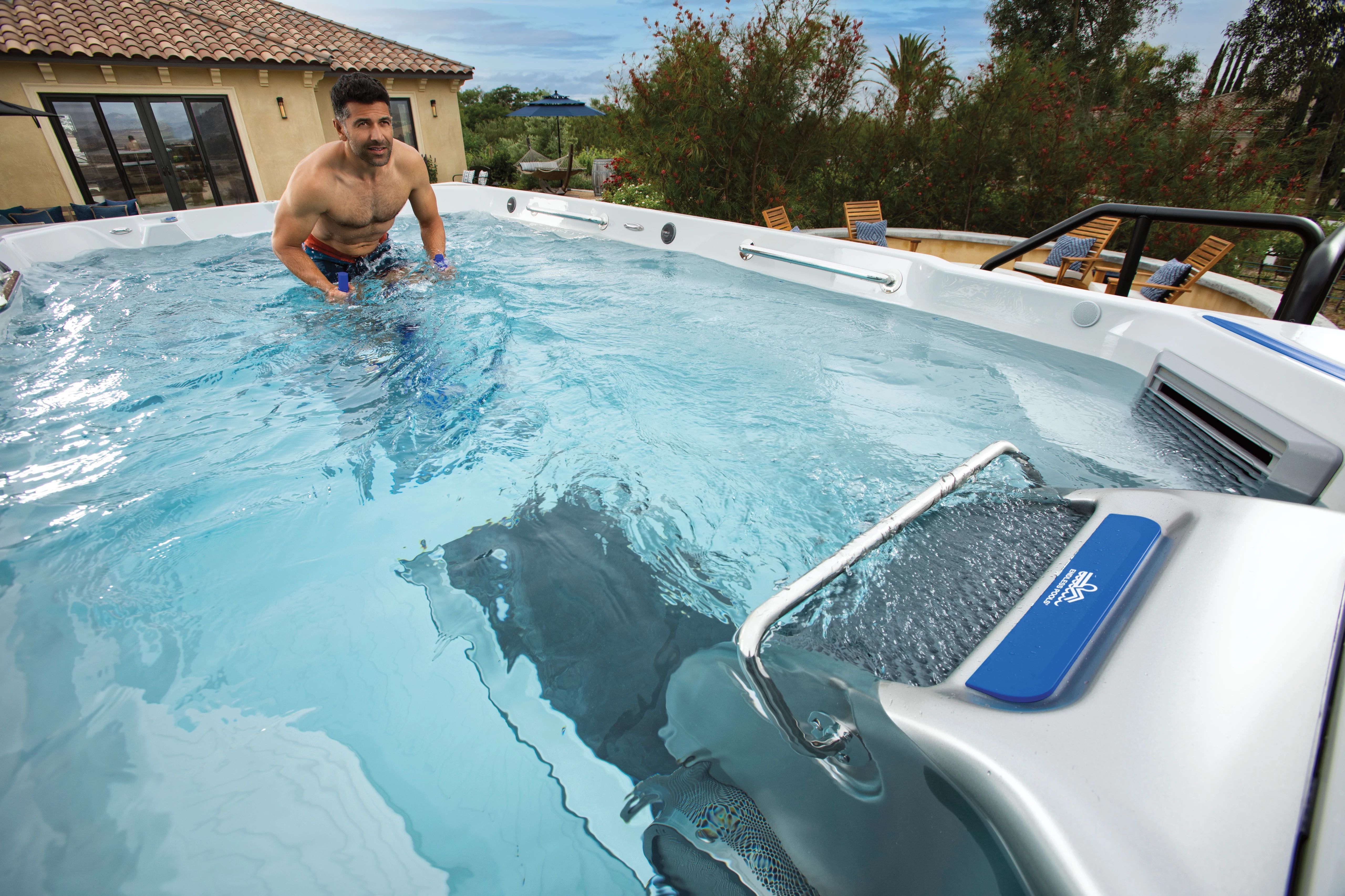 Man On Aqua Bike In Swim Spa