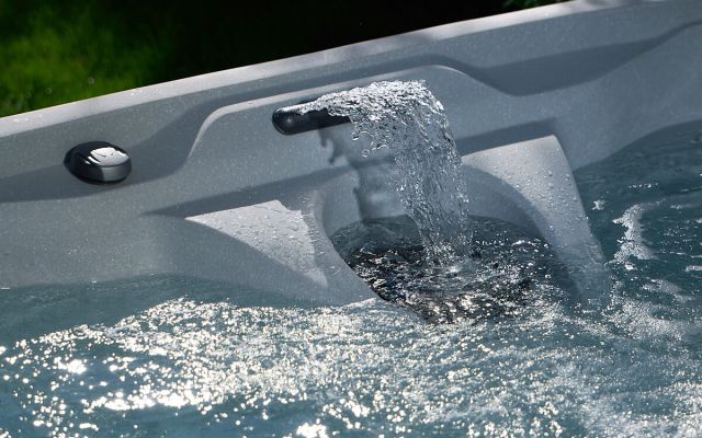 family enjoys freeflow hot tub