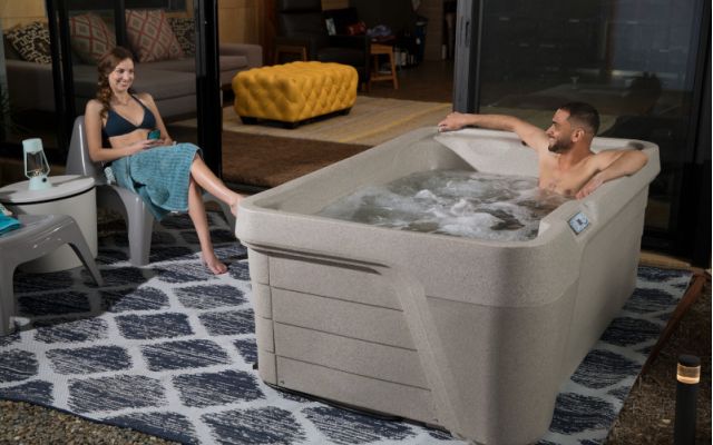 family enjoys freeflow hot tub