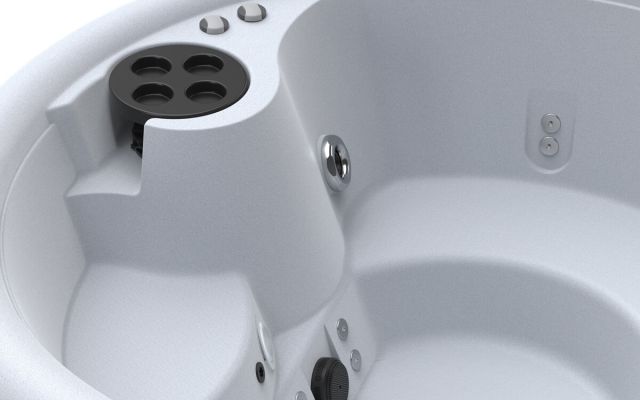 young girl enjoys freeflow hot tub