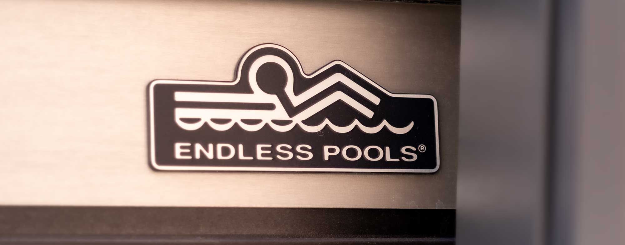 The endless pools badge on the side of one of their swim spas