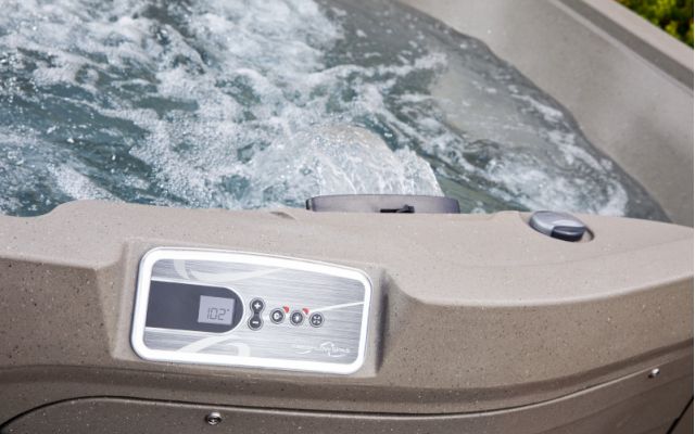 family enjoys freeflow hot tub